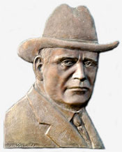 Sam Lancaster bust carving.