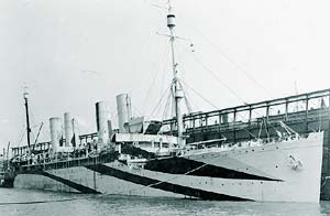 USS Von Steuben's side painted with swaths of diagonal black designed to camouflage.