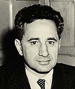 Photo of Elia Kazan in suit and tie.