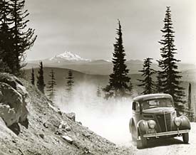 Car on dirt road.