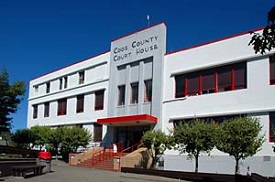 Three story Coos County Courthouse.