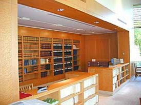 Wooden shelving in the reference room at the archives holds card indexes.