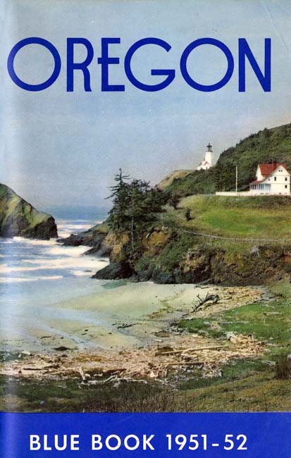 Colored photo by the Oregon State Highway Commission of Heceta Head with a small beach in the foreground