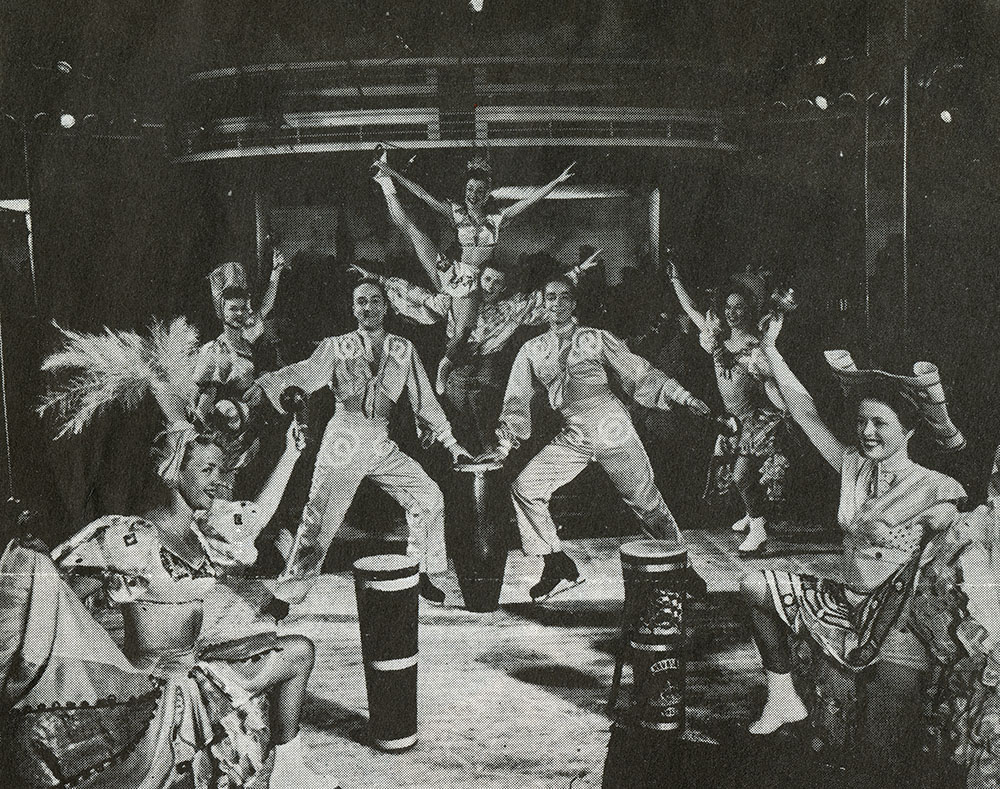 Members of an ice skating show pose