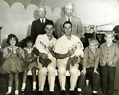 Several sets of twins pose