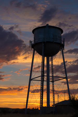 A water tower during a sunset in Burns Oregon.