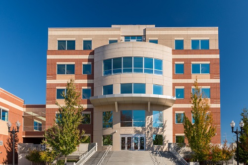 Six-story building, the Hillsboro Civic Center is a modern glass building with a stone base & brick highlights.