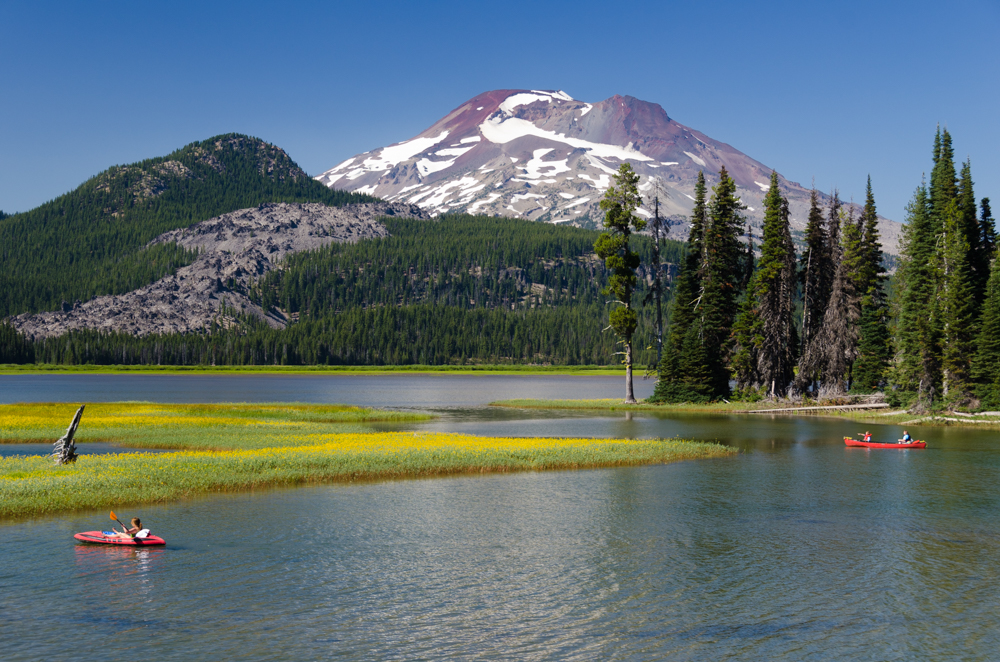 lake with snowy mountain in the distance