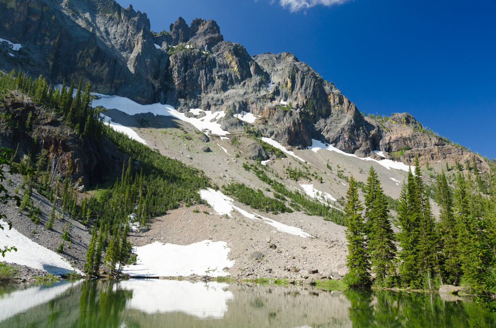 lake with rocky hillside in background