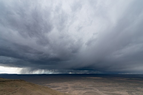 stormy clouds hovering above the ground